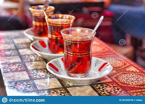 Three Tea Glasses of Traditional Turkish Tea with Spoons on Backgammon Table Stock Photo - Image ...