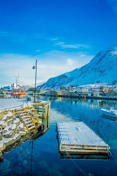 Henningsvaer, Norway - April 04, 2018: Outdoor View of Fishing Port with Wooden Floating ...