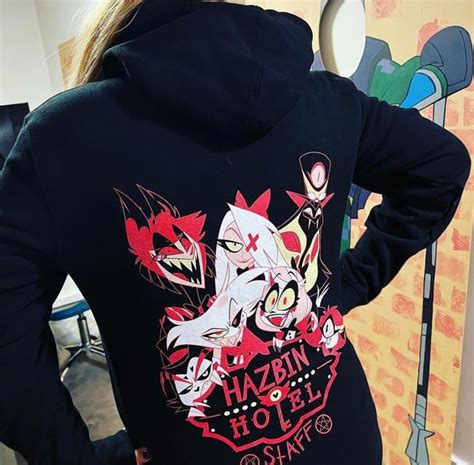 The team members that worked on hazbin hotel got their own merch. It's ...