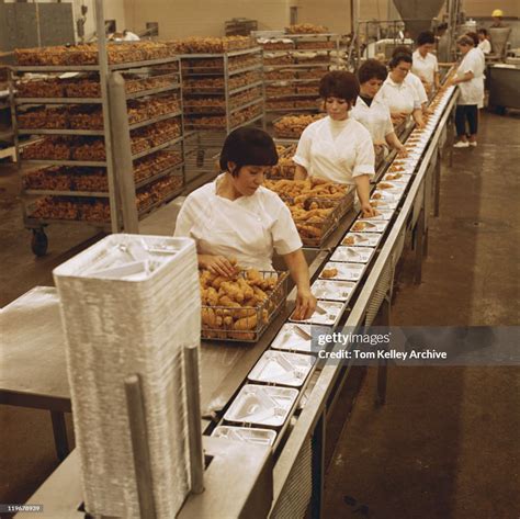 Female Workers Working At Food Processing Plant High-Res Stock Photo ...