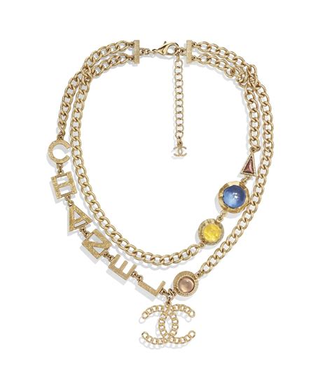 Discover the CHANEL Metal, Glass & Resin Gold, orange, blue & green Necklace, and explore the ...