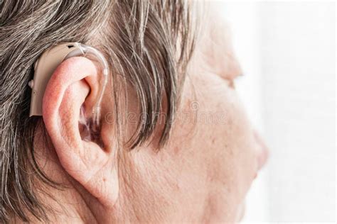 Old Woman Hearing Aid Stock Images - Download 388 Royalty Free Photos
