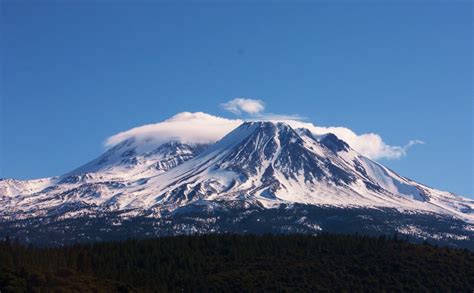 Snow covered Mt. Shasta volcano in Cascade by InspiredShots