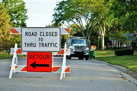 Road Closed To Thru Traffic Detour Construction Sign in a Residential Neighborhood Stock Image ...