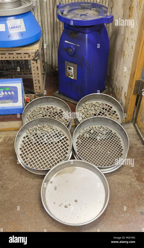 Sieves showing the different size materials from a test sample ...