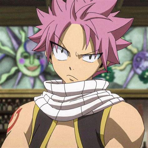 an anime character with pink hair looking at the camera