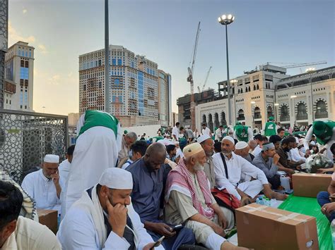 Mecca, Saudi Arabia, April 2023 - Pilgrims from different countries around the world are busy ...