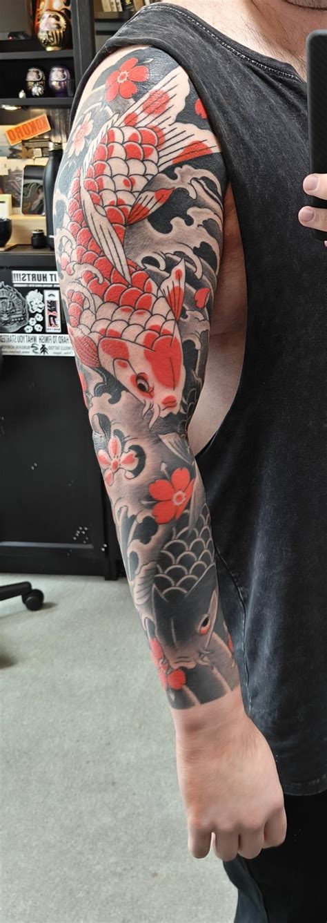 Koi fish sleeve tattoo finished : r/irezumi