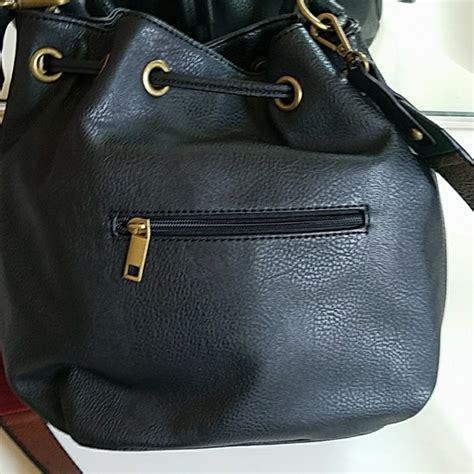 87% off Carlos Santana Handbags - Carlos by Carlos Santana Bucket Bag ...