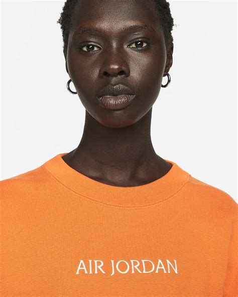 Air Jordan Women's Crew Sweatshirt. Nike PT