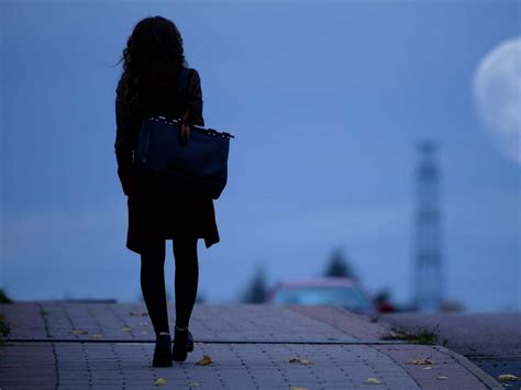 Woman Walking Alone At Night