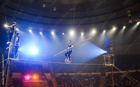 Tightrope walkers at the circus. Stock Photo | Adobe Stock