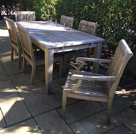 Teak - Outdoor Teak Dining Table & Six Chairs | Rafael Osona Auctions Nantucket, MA