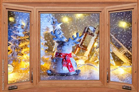 Holidays in winter scenery - view through the window - funny Christmas ...