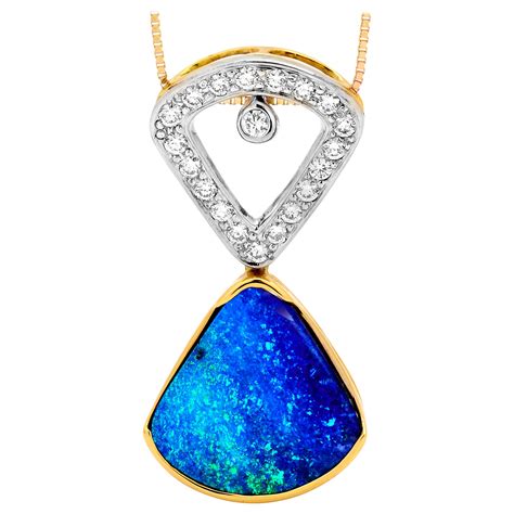 Boulder Opal Pendant with 22 Karat Yellow Gold and Silver For Sale at 1stDibs