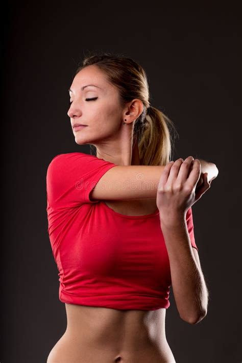 Biceps Arm Stretching Exercise by a Woman Stock Photo - Image of sport, burn: 82916268