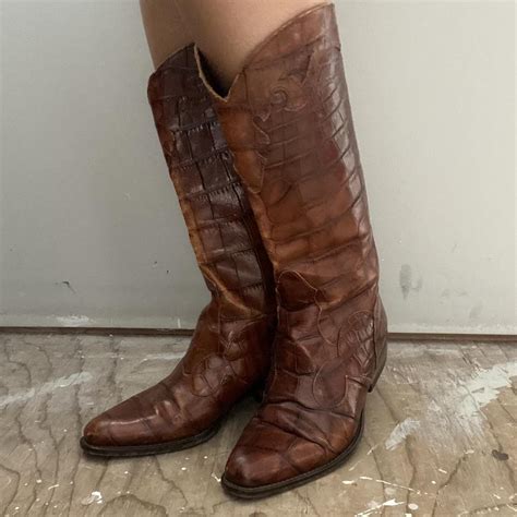 Vintage brown leather cowboy boots. Shows some wear.... - Depop