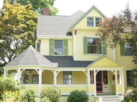 Beautiful exterior paint job just outside of Boston, MA. | Yellow house exterior, White exterior ...