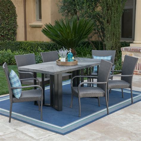 Fabiana Outdoor 7 Piece Wicker Dining Set with Textured Finish Light ...