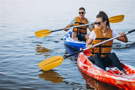 Couple together kayaking on the river