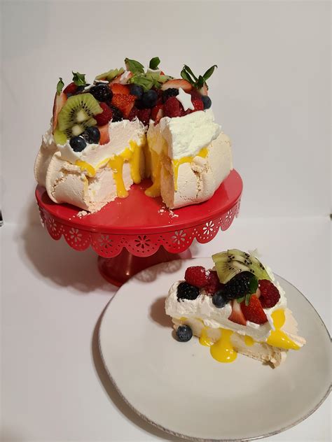 Week 4: Australia - Pavlova with passionfruit curd and mixed berries : r/52weeksofbaking