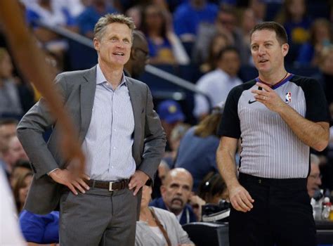 Golden State Warriors head coach Steve Kerr talks to a referee during ...