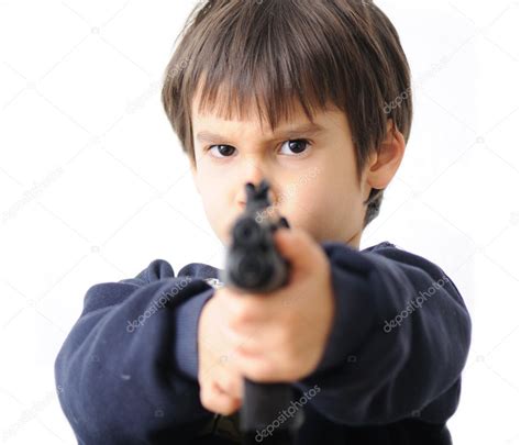 Pointing gun at camera | Boy pointing gun at camera — Stock Photo © ZouZou #1926141