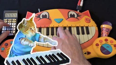 KEYBOARD CAT SONG ON A CAT PIANO AND A DRUM CALCULATOR - YouTube
