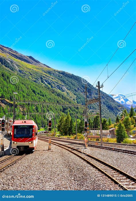 Zermatt, Switzerland - August 24, 2016: Train at Railway Station in Zermatt, Valais Canton, in ...