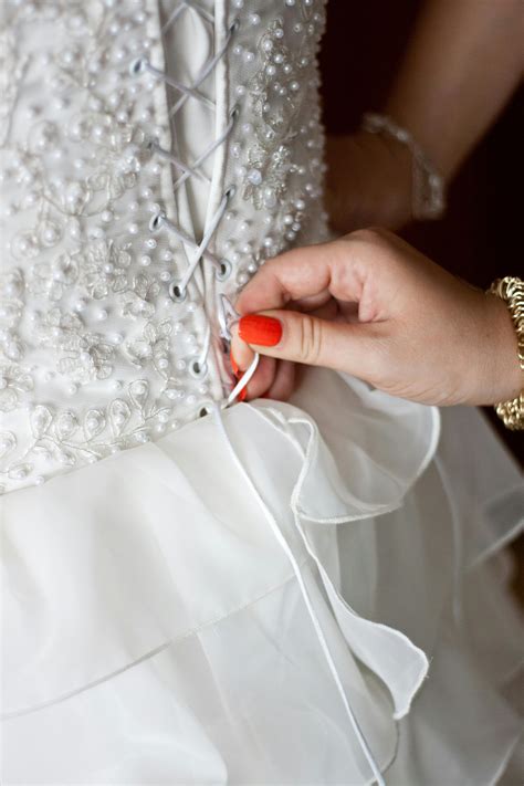 Tie a Corset Back Wedding Dress · Free Stock Photo