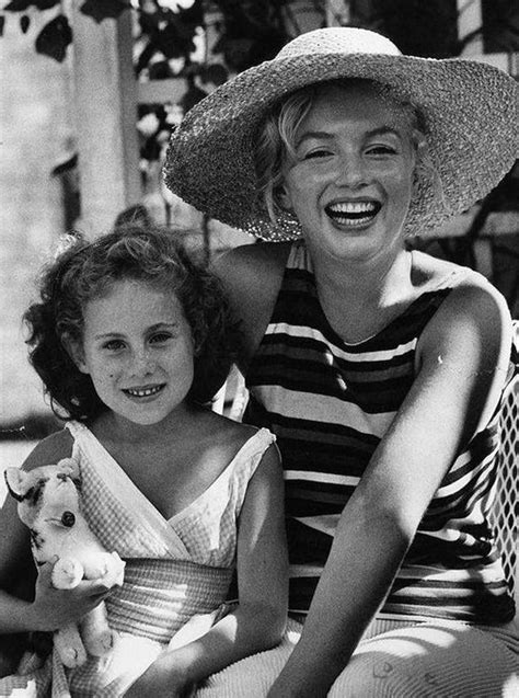 eternalmarilynmonroe: ““Marilyn Monroe photographed with the daughter ...