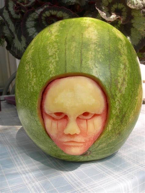 Artist Transforms Watermelons into Creepy Realistic Faces and Dinosaurs