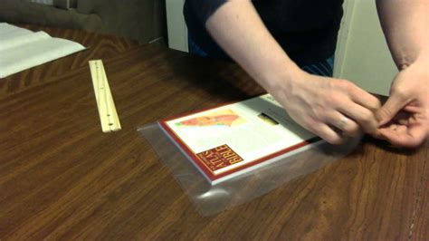 How to Laminate a Book Cover - YouTube