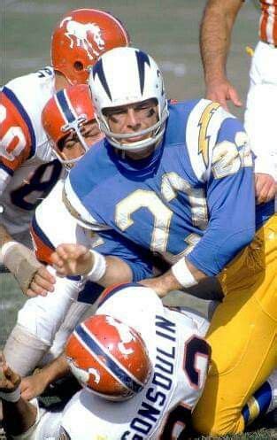 Chargers Keith Lincoln battles the Broncos. | Football, Chargers football, Football uniforms