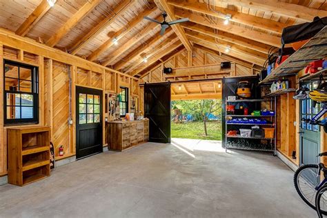 garage workbench ideas Garage And Shed Rustic with barnhouse bike area bike storage black barn ...