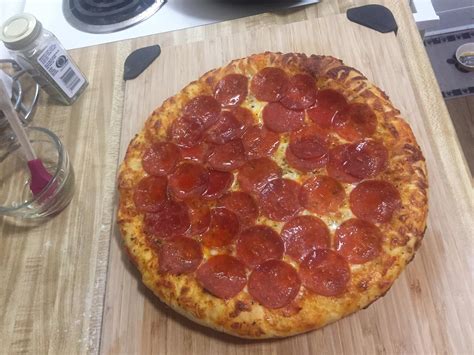 [homemade] ish cast iron pizza. Store bought frozen dough ball, Rao’s pizza sauce, Italian ...