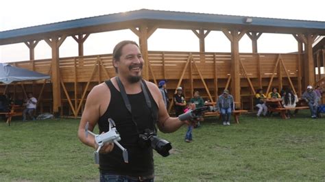 Documenting powwows through film, photos helps Saulteaux man reconnect with culture | CBC News