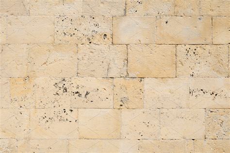 Texture of old limestone brick wall | Abstract Stock Photos ~ Creative Market