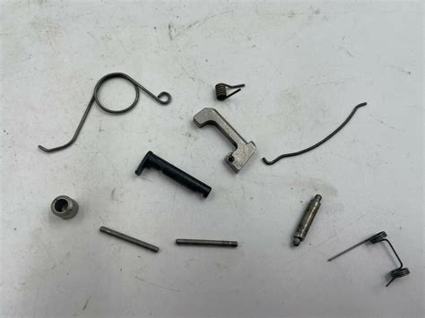 RUGER P97DC 45ACP PISTOL PARTS, HAMMER PIVOT/LEVER/PINS/SPRINGS/BUSHINGS – Postrock Gun Parts