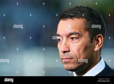 Giovanni Van Bronckhorst, manager of Rangers FC, being interviewed at Ibrox Park football ...
