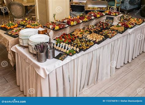Catering buffet table stock photo. Image of decoration - 172376878