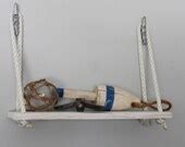 Items similar to Hanging Nautical Shelf, from Boat Cleats - White distressed Wooden Shelf on Etsy