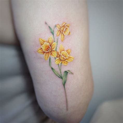 Complete Guide to Flower Tattoos: Origin and Meanings - TattoosWizard