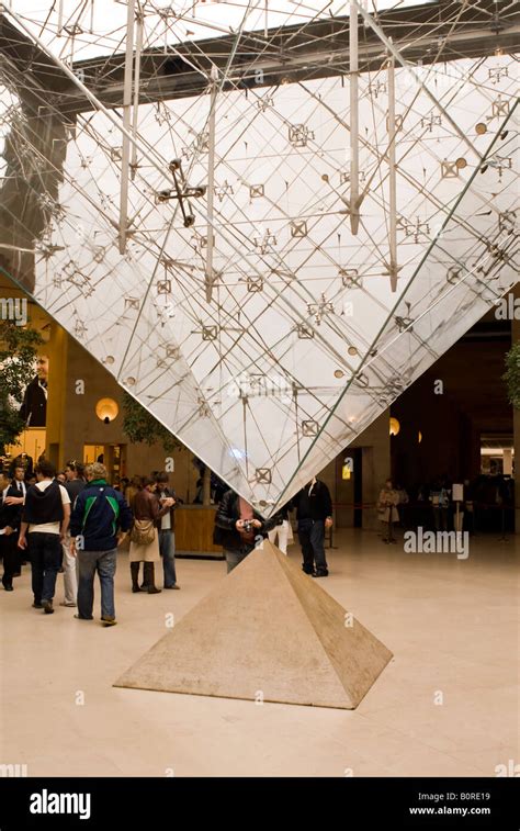 The inverted pyramid inside the Louvre Museum in Paris France Stock Photo - Alamy