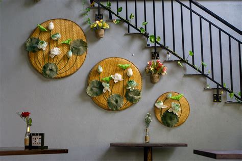 Wall Decorations with Flowers on Bamboo Boards and Basket Plant Pots inside a modern Vietnamese ...