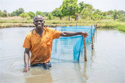 Fish farmer in Zambia. Photo by Chosa Mweemba. | Happy farme… | Flickr
