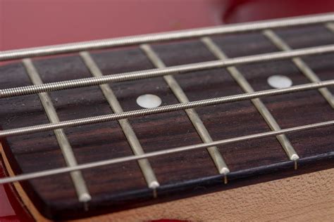 Electric Guitar Frets on the neck closeup - Creative Commons Bilder