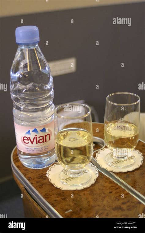 Champagne and mineral water served in Emirates airline Business Class ...