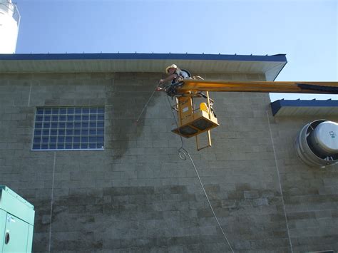 Spraying Concrete Sealer | myconcretemakeover.com | Flickr