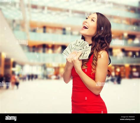 woman in red dress with us dollar money Stock Photo - Alamy